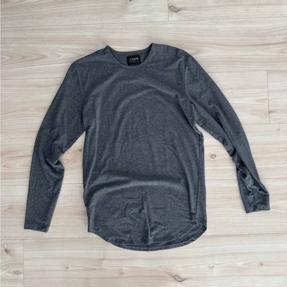 Cuts clothing l/s shirt.